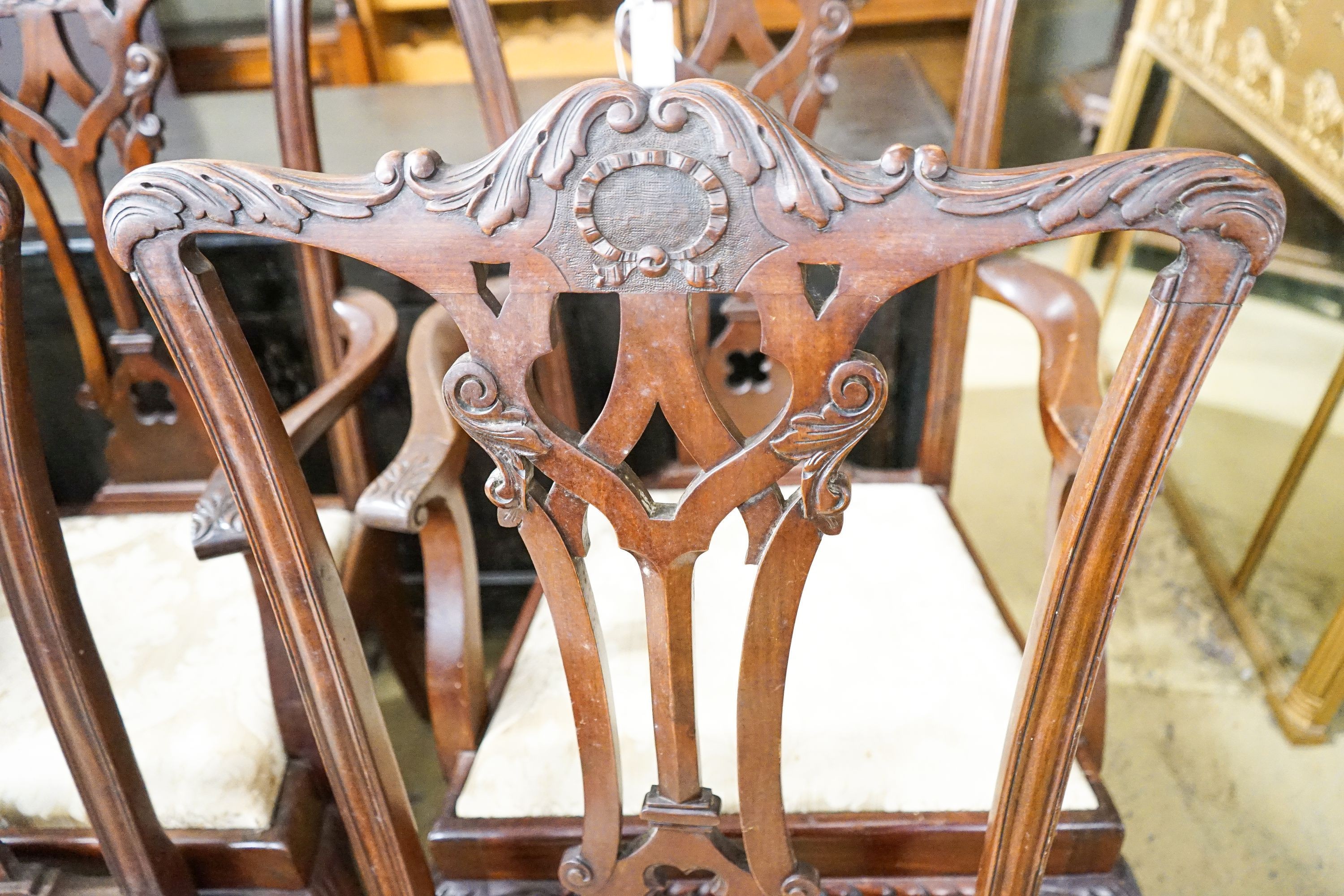 A set of six George III style mahogany dining chairs, (two with arms)